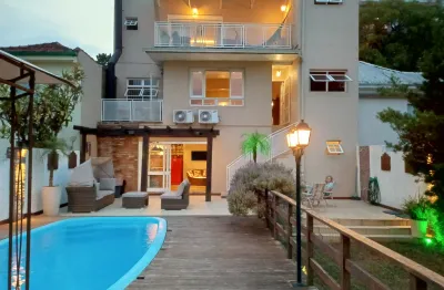 Casa mobiliada 5 vagas, 400m2 próxima a carlos gomes