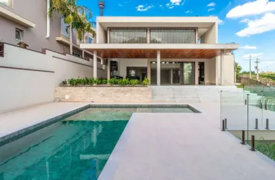Sobrado com 4 dormitórios à venda, 541 m² por r$ 7.500.000,00 - residencial jatibela - campinas/sp