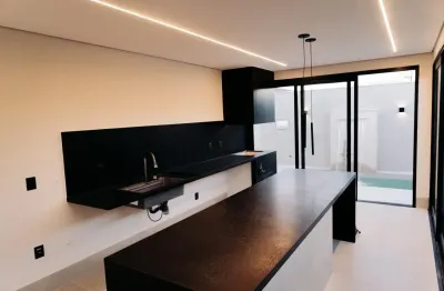 Casa a venda no condomínio florais do parque com 03 suítes e pisicina