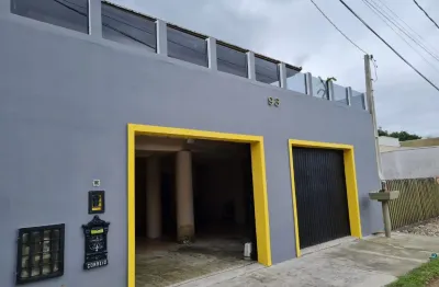 Sobrado com área térrea, 4 quartos na faixa do mar!