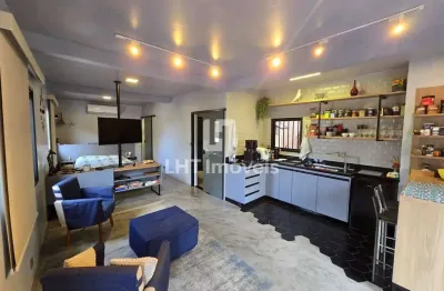 Casa com três quartos sendo uma suíte, com uma piscina mais loft completo.