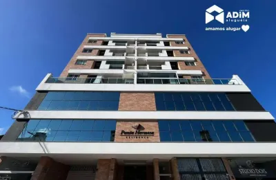 Aluguel anual: apartamento semi mobiliado com 2 quartos sendo 1 suíte bairro das nações em balneário camboriú.
