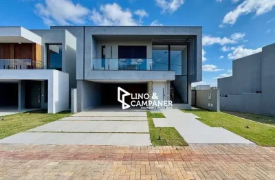 Casa com 3 suítes à venda, 210 m² por r$ 1.650.000 - condomínio parque tauá - araçari - londrina/pr