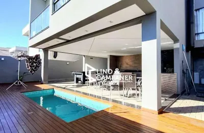 Residência exclusiva no condomínio aranguá com 3 dormitórios sendo 01 suíte, piscina aquecida e área gourmet!