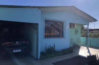 Casa com galpão localizado no bairro estância velha/canoas