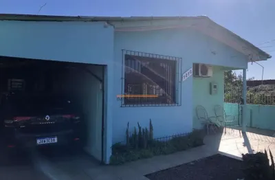 Casa com galpão localizado no bairro estância velha/canoas