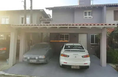 Casa em condomínio localizada no bairro harmonia/canoas