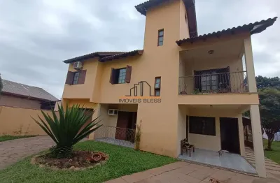 Casa em condomínio fechado com 5 quartos para alugar no Harmonia, Canoas 