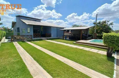 Casa em condomínioc com 5 suítes com piscina e pub inglês