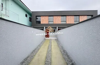 Geminado pronto para morar no bairro comasa com 2 dormitórios, 2 vagas de garagem e 10 metros de fundos.