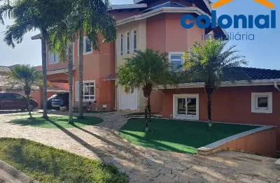 Casa no condomínio terras do caribe em valinhos com  3 suítes, escritório, 6 banheiros, piscina aquecida, vista livre, 4 vagas 350m².santa cruz,