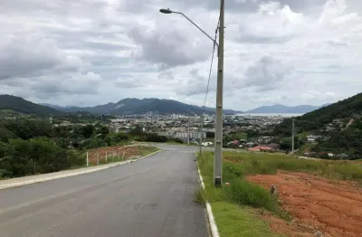 Terreno à venda na rua homero de miranda gomes, fundos, biguaçu por r$ 200.000