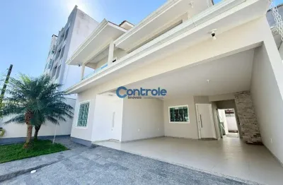 Casa com 3 quartos à venda na rua ímola, 35, pagani, palhoça por r$ 1.190.000