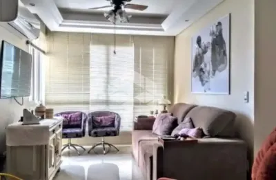 Apartamento três dormitórios com suíte e duas vagas de garagem