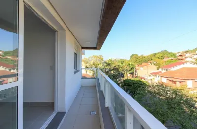 Apartamento 2 dormitórios 1 com suíte e 2 vagas no Bairro Tristeza