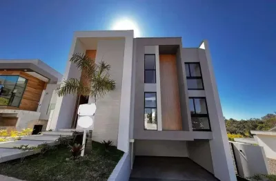 Conforto e estilo em dois andares: casa com 4 dormitórios, 2 suítes em condomínio fechado!