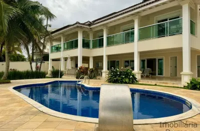 Linda casa com piscina, frente mar, pé na areia na praia do tenório