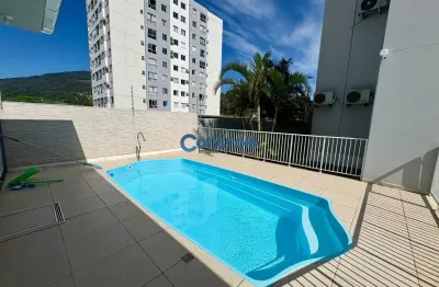 Apartamento térreo  c/ 02 dormitórios e sacada com churrasqueira em biguaçu