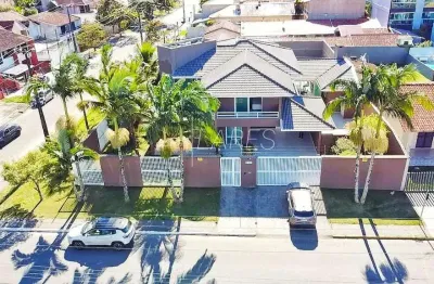 Casa com 396.14 m², 4 quartos sendo 4 suítes à venda na praia brava de caiobá.