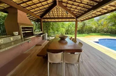 Casa 4 suítes no condomínio casas da praia do forte-ba