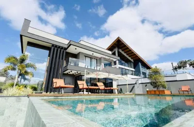 Casa com 4 dormitórios à venda, 380 m² por r$ 4.500.000,00 - condomínio reserva ibirapitanga - santa isabel/sp