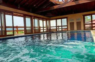 Casa com 7 dormitórios à venda, 950 m² por R$ 4.500.000,00 - Condomínio Reserva Ibirapitanga - Santa Isabel/SP