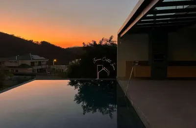 Casa com 5 dormitórios, 540 m² - venda por R$ 4.000.000 ou aluguel por R$ 18.000/mês - Condomínio Reserva Ibirapitanga - Santa Isabel/SP