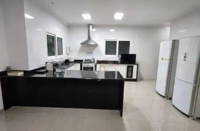 Casa com 4 dormitórios à venda, 350 m² por R$ 2.400.000,00 - Condomínio V - Arujá/SP