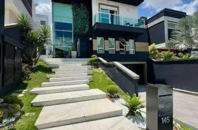 Casa com 3 dormitórios à venda, 385 m² por R$ 3.400.000,00 - Condomínio Real Park - Arujá/SP