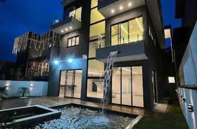 Casa com 6 dormitórios, 650 m² - venda por R$ 3.200.000,00 ou aluguel por R$ 19.000,00 - Condomínio Arujá Ville II - Arujá/SP