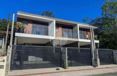 Residencial málaga - sobrado de alto padrão com piscina e 3 suítes no residencial málaga – anita garibaldi, joinville