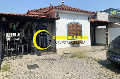 Casa em brás de pina com quintal e vagas de garagem