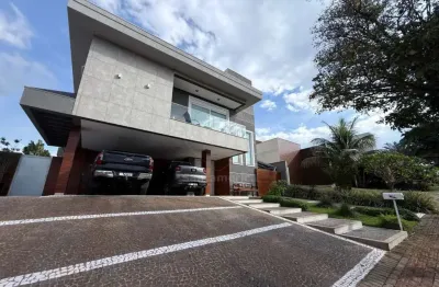 Casa para venda no condomínio sun lake com 3 suítes, piscina privativa e cozinha planejada