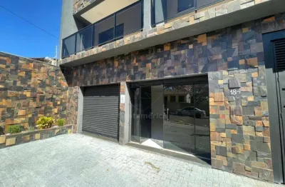 Loja para alugar com porta de vidro, próxima ao shopping boulevard