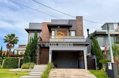 Casa em condomínio fechado com 3 quartos à venda na avenida alphaville, 2745, alphaville, gravataí por r$ 2.990.000