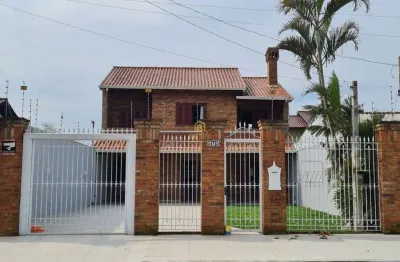 Casa com 4 quartos à venda na Rua Coronel Sampaio, 575, Parque dos Eucalíptos, Gravataí por R$ 750.000