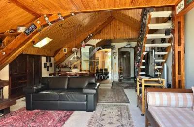 Loft clássico com ambiente amplo e integração com a natureza