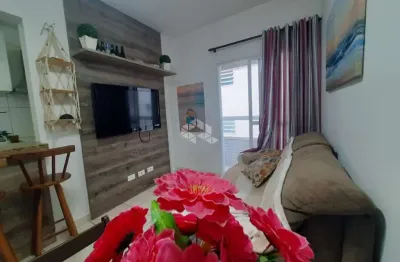 Apto com sacada a venda em vila mirim praia grande sp 50 mts da praia