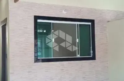 Casa geminada a venda na praia grande, bairro maracanã, com 2 quartos 1 suite e 2 vagas