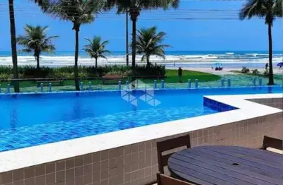 Seu novo lar de frente para o mar, 2 dorms  1suíte no caiçara com lazer completo!