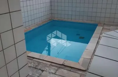 Apartamento a  venda em praia grande,  vila tupi, com 1 quarto e 1 vaga