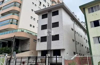 Apartamento térreo a venda em aviação praia grande, com 2 dormitorios e 1 vaga