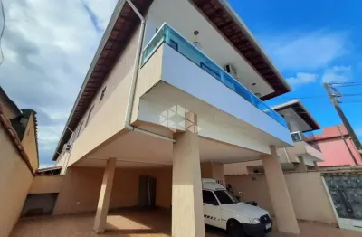 Casa em condomínio a venda no bairro antartica, praia grande, com 3 quartos, 1 suite e 1 vaga