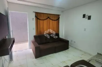 Casa sobrado de condomínio, mobiliado, 02 dormitórios, 01 sala, 01 cozinha, 01 banheiro, 01 lavabo, 01 área de serviço, 01 vaga de garagem, lado praia