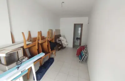 Apartamento a venda na praia grande, no bairro real, com 2 quartos 1 suite e 1 vaga.