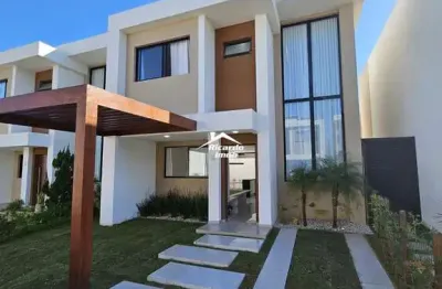 Casa 3 suítes com quintal e varanda gourmet no condomínio Foz do Joanes