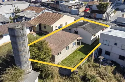 Atuba - terreno com duas casas - investimento para locação ou moradia