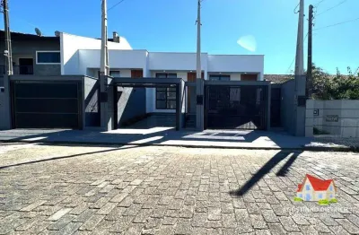 Casas geminadas terreas c/02 quartos c/suite + vaga de garagem + espaco aos fundos c/churrasqueira no bairro iririu!