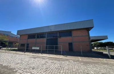 Inbox cia imobiliária aluga - pavilhão com docas e pátio cercado.