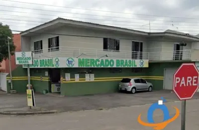 Casa 3 dormitórios, sendo 1 suíte, sala ampla, área de serviços, 2 vagas de garagens fechadas, super mercados montado no salão térreo,